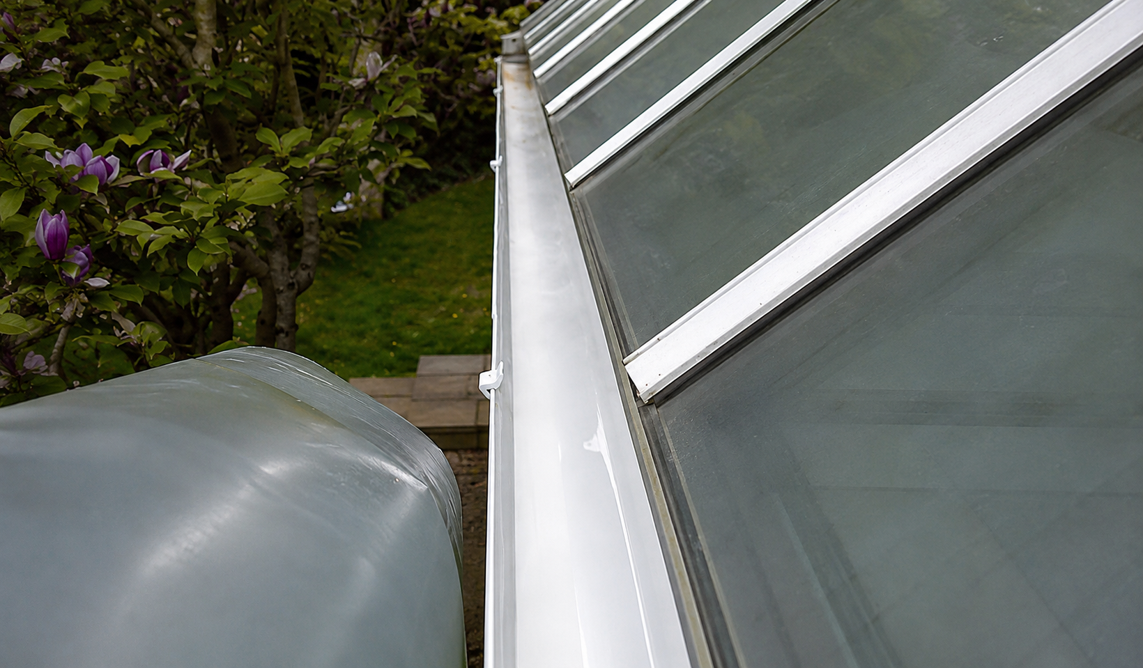 Gutter fully cleared after professional cleaning — showing the result of a properly scheduled, species-aware gutter maintenance visit